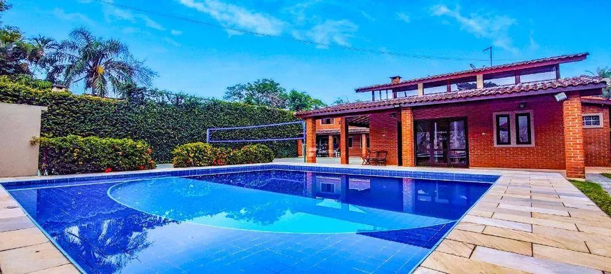 Foto 1 de Casa com 5 Quartos à venda, 324m² em Balneário Praia do Pernambuco, Guarujá