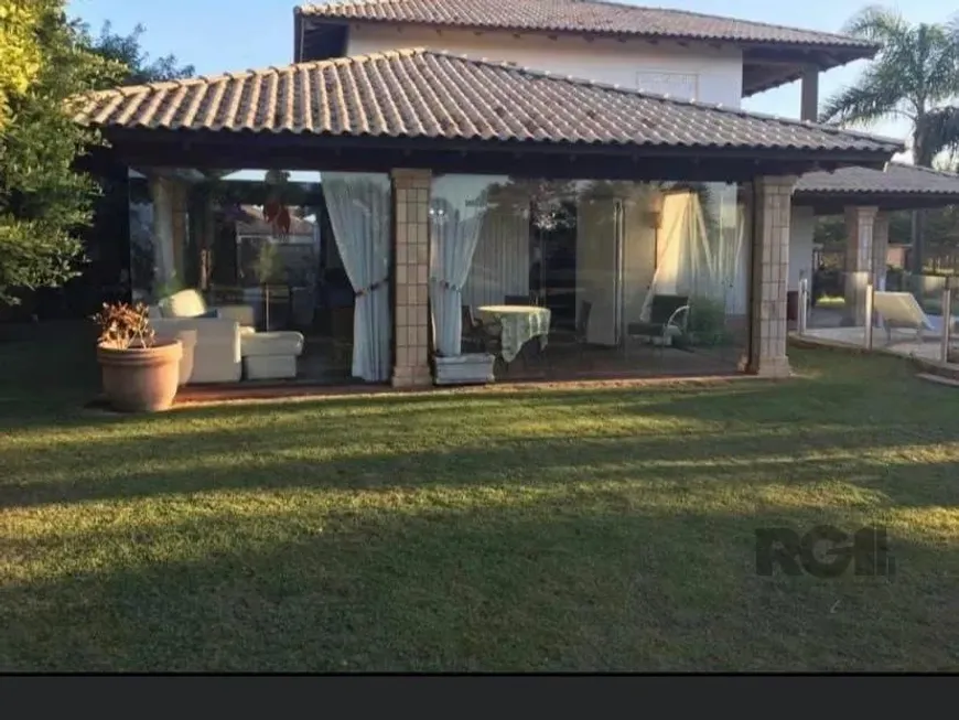 Foto 1 de Casa com 4 Quartos à venda, 419m² em Atlantida, Xangri-lá