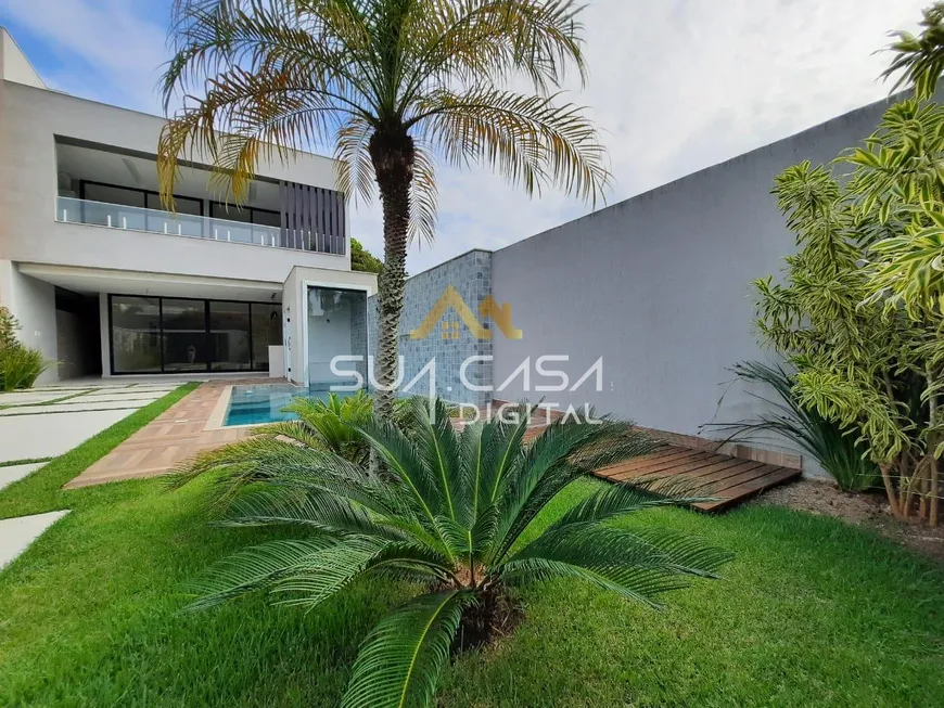 Foto 1 de Casa de Condomínio com 4 Quartos à venda, 360m² em Barra da Tijuca, Rio de Janeiro