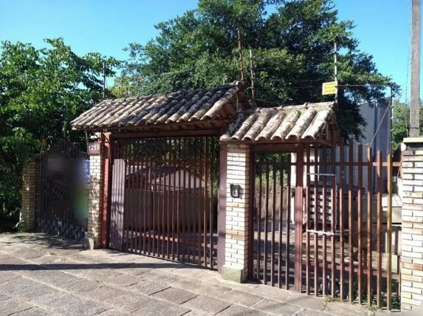 Foto 1 de Casa de Condomínio com 3 Quartos à venda, 134m² em Teresópolis, Porto Alegre