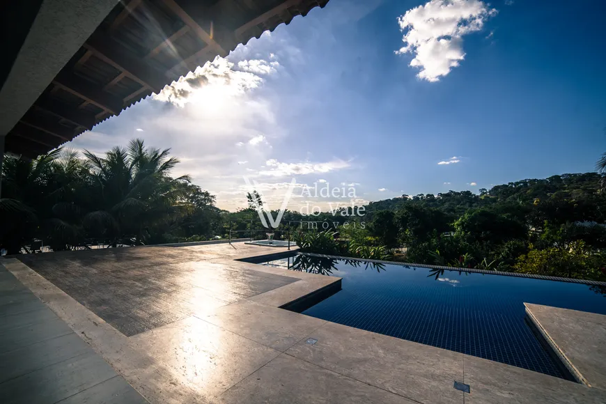 Foto 1 de Casa de Condomínio com 5 Quartos à venda, 565m² em Residencial Aldeia do Vale, Goiânia