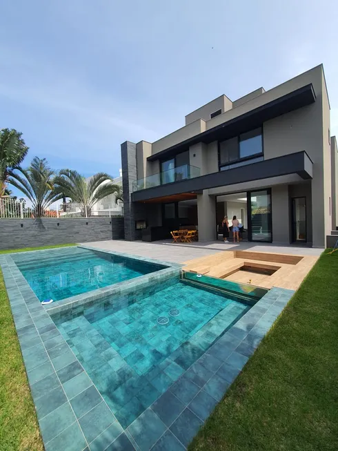 Foto 1 de Casa com 3 Quartos para alugar, 300m² em Jurerê Internacional, Florianópolis