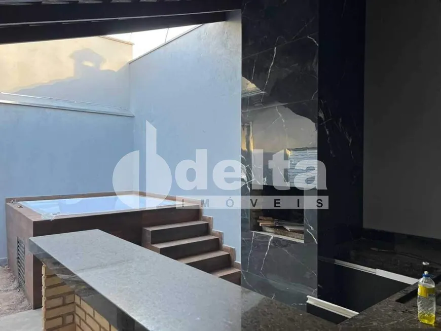 Foto 1 de Casa com 3 Quartos à venda, 181m² em Alto Umuarama, Uberlândia