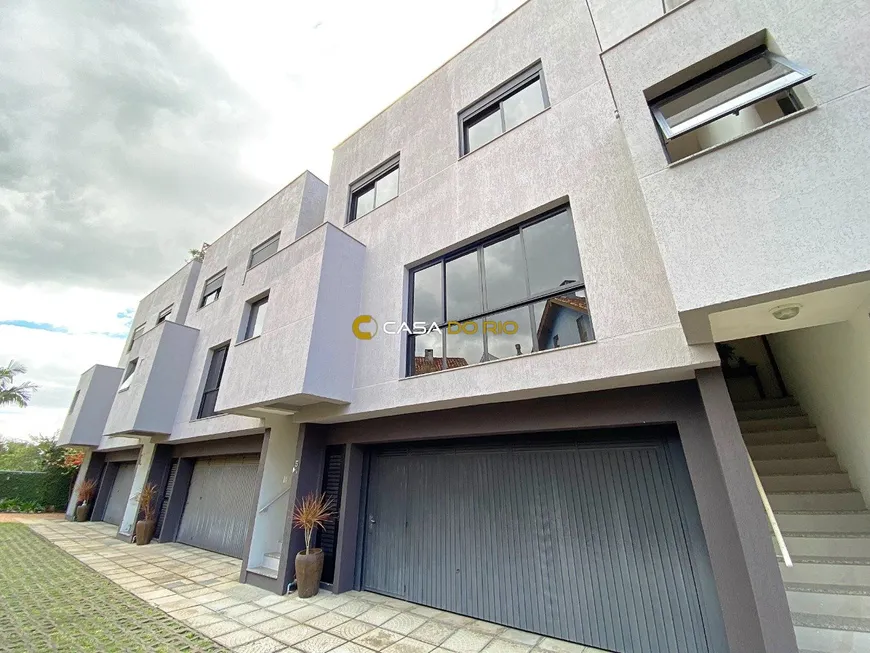 Foto 1 de Casa de Condomínio com 3 Quartos à venda, 212m² em Tristeza, Porto Alegre
