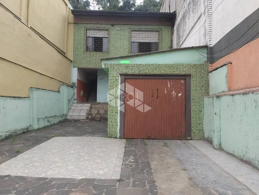 Foto 1 de Casa com 4 Quartos à venda, 136m² em Agronomia, Porto Alegre
