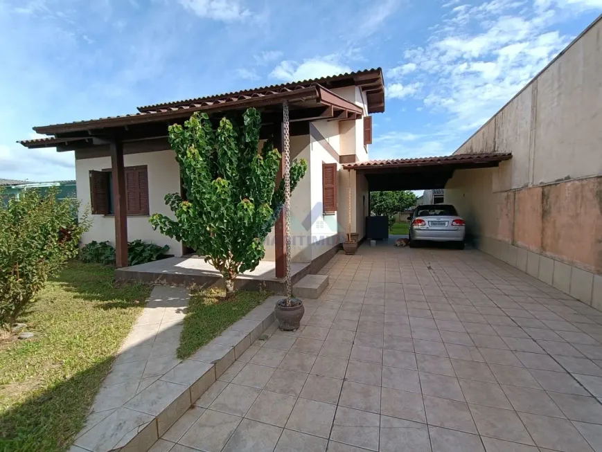 Foto 1 de Casa com 3 Quartos à venda, 109m² em Igra sul, Torres