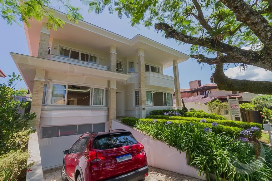 Foto 1 de Casa com 5 Quartos à venda, 380m² em Jurerê Internacional, Florianópolis