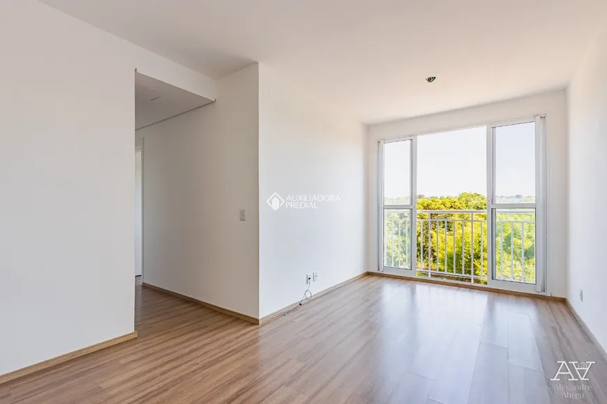 Foto 1 de Apartamento com 2 Quartos à venda, 58m² em Vila Nova, Porto Alegre