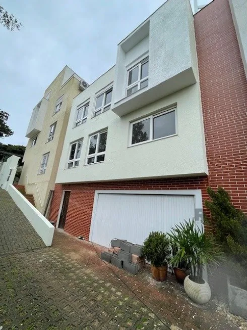 Foto 1 de Casa de Condomínio com 3 Quartos à venda, 156m² em Ipanema, Porto Alegre