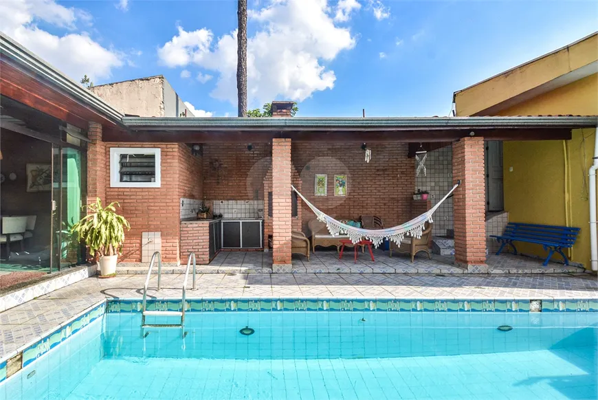 Foto 1 de Casa com 4 Quartos à venda, 159m² em Campo Belo, São Paulo