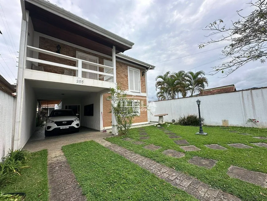 Foto 1 de Sobrado com 4 Quartos à venda, 270m² em Martim de Sa, Caraguatatuba