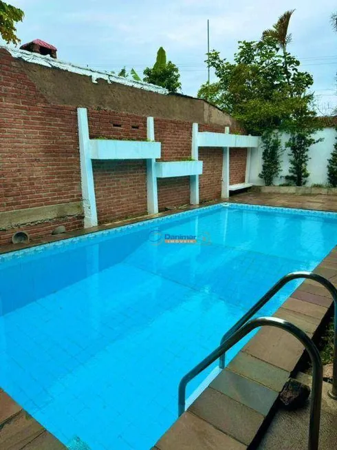 Foto 1 de Casa de Condomínio com 4 Quartos à venda, 470m² em Jardim Virgínia , Guarujá