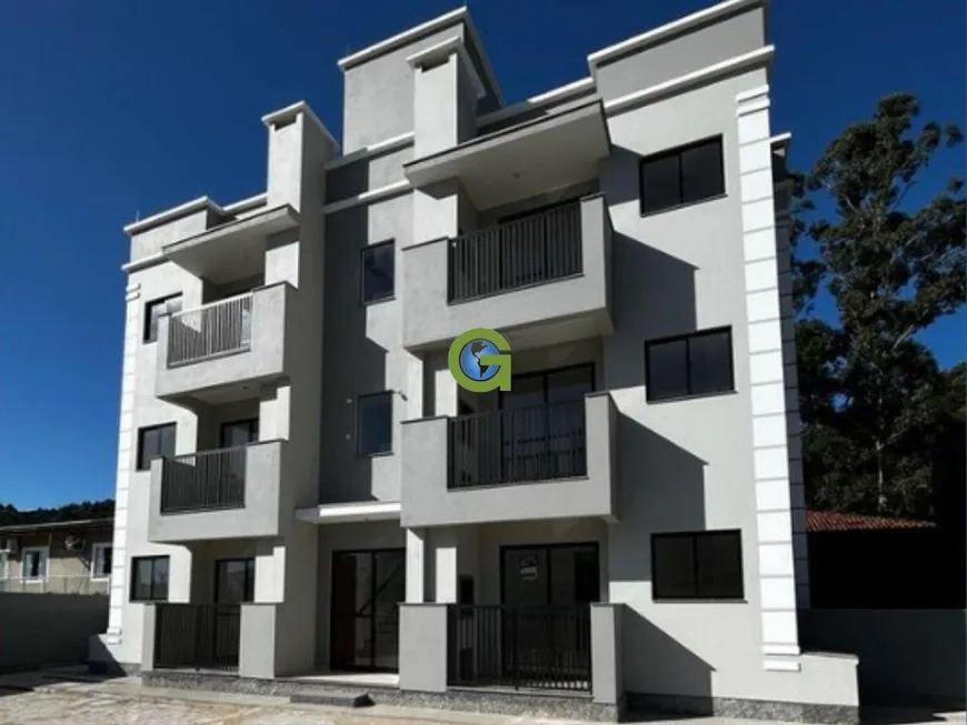 Foto 1 de Apartamento com 2 Quartos à venda, 57m² em Praia de Fora, Palhoça