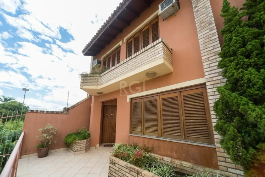 Foto 1 de Casa de Condomínio com 3 Quartos à venda, 239m² em Tristeza, Porto Alegre