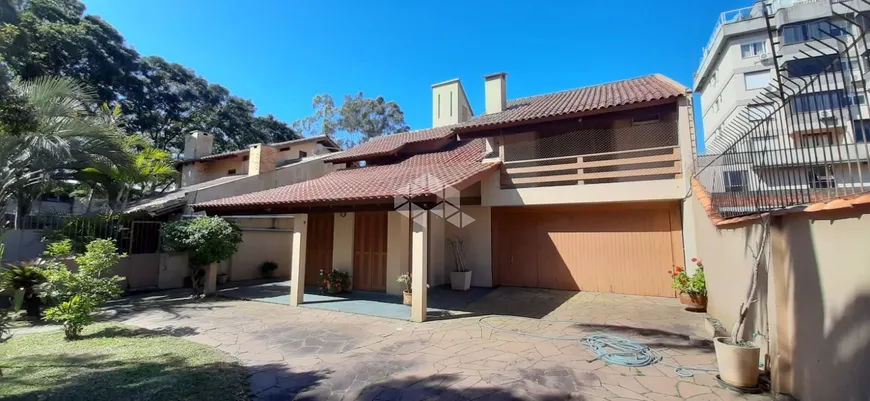 Foto 1 de Casa com 3 Quartos à venda, 244m² em Partenon, Porto Alegre