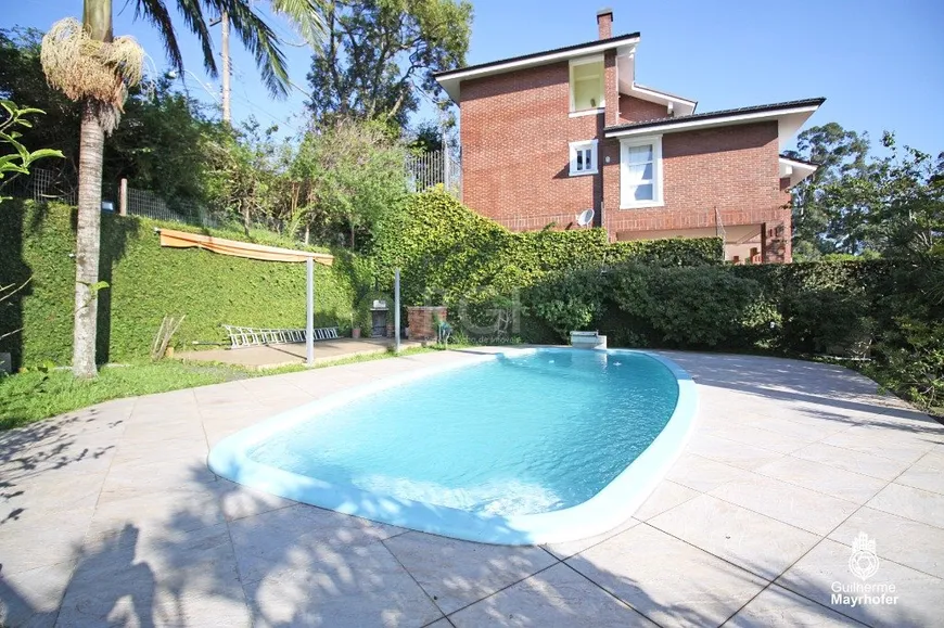 Foto 1 de Casa com 4 Quartos à venda, 345m² em Teresópolis, Porto Alegre