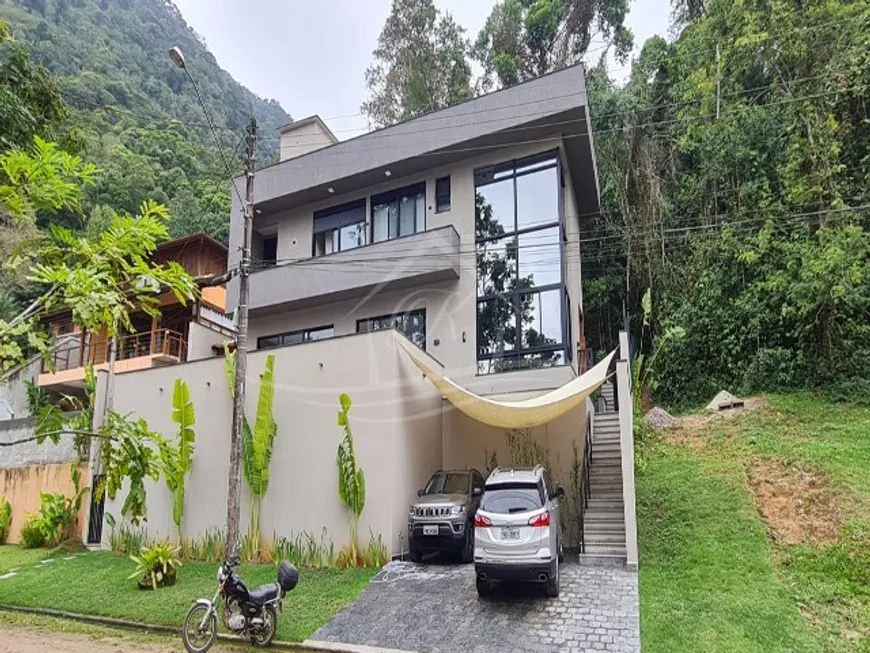 Foto 1 de Casa de Condomínio com 4 Quartos à venda, 230m² em Lagoinha, Ubatuba