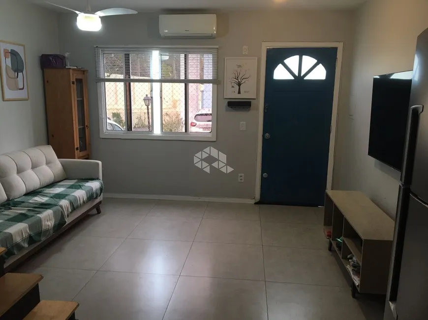Foto 1 de Casa de Condomínio com 2 Quartos à venda, 79m² em Cavalhada, Porto Alegre