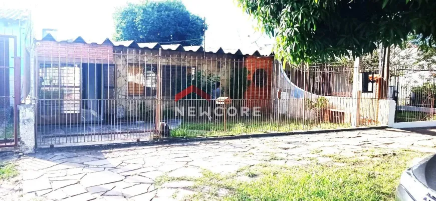 Foto 1 de Casa com 3 Quartos à venda, 100m² em Santa Fé, Porto Alegre