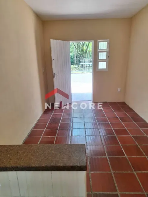 Foto 1 de Casa com 2 Quartos à venda, 56m² em Cidade Jardim, Caraguatatuba