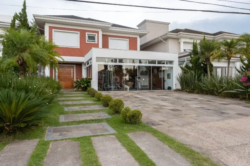 Foto 1 de Casa de Condomínio com 3 Quartos à venda, 394m² em Belém Novo, Porto Alegre