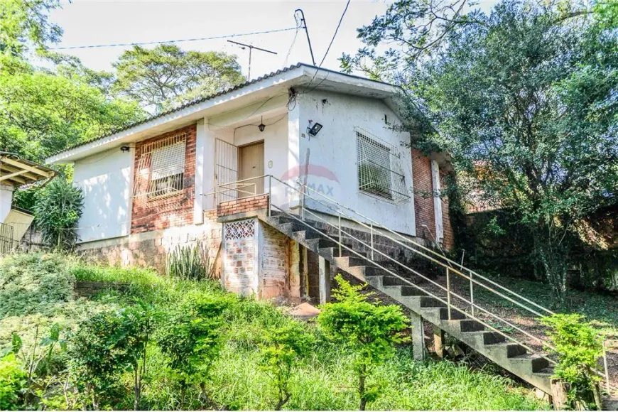 Foto 1 de Casa de Condomínio com 3 Quartos à venda, 67m² em Santa Tereza, Porto Alegre