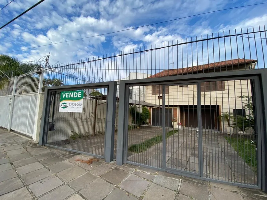 Foto 1 de Casa com 6 Quartos à venda, 530m² em Jardim São Pedro, Porto Alegre