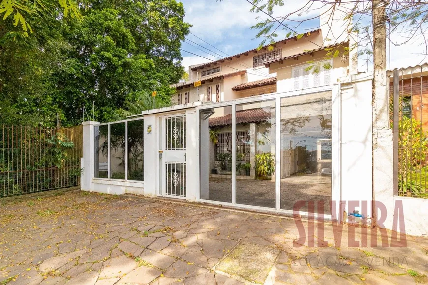 Foto 1 de Casa com 6 Quartos para venda ou aluguel, 500m² em Teresópolis, Porto Alegre