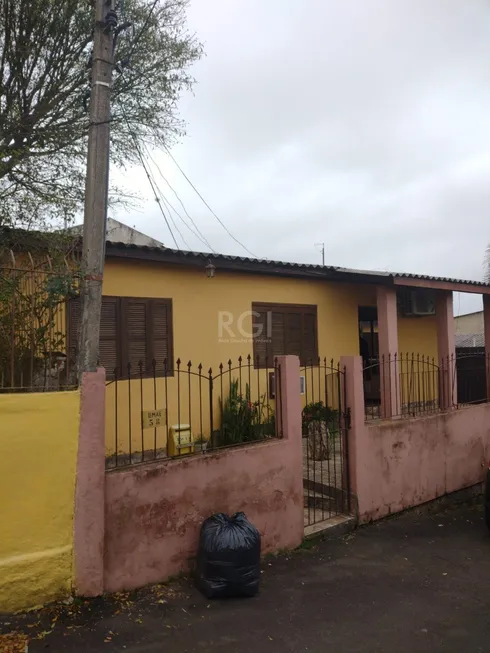 Foto 1 de Casa com 4 Quartos à venda, 301m² em Vila Nova, Porto Alegre