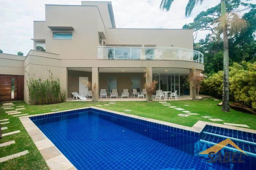 Foto 1 de Casa de Condomínio com 6 Quartos à venda, 510m² em Riviera de São Lourenço, Bertioga