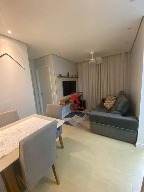 Foto 1 de Apartamento com 2 Quartos à venda, 46m² em Areia Branca, Santos