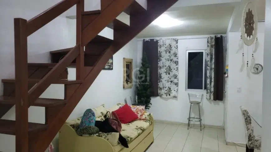 Foto 1 de Casa de Condomínio com 3 Quartos à venda, 144m² em Santa Fé, Porto Alegre