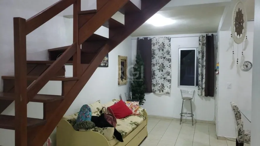 Foto 1 de Casa de Condomínio com 3 Quartos à venda, 146m² em Santa Fé, Porto Alegre