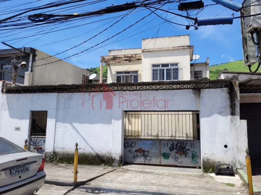 Foto 1 de Casa com 4 Quartos à venda, 239m² em Centro, Nova Iguaçu