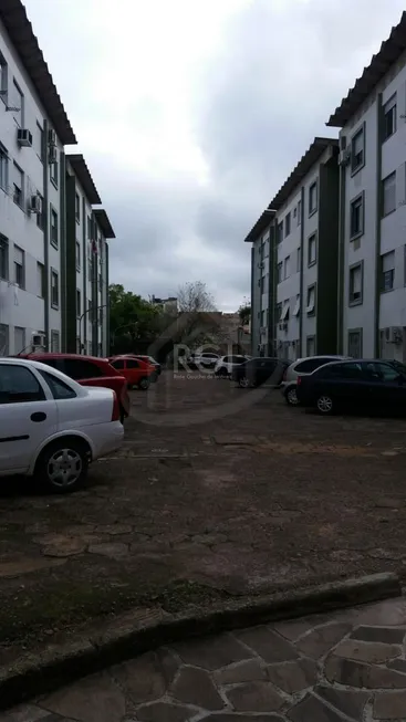 Foto 1 de Apartamento com 2 Quartos à venda, 54m² em Vila Nova, Porto Alegre
