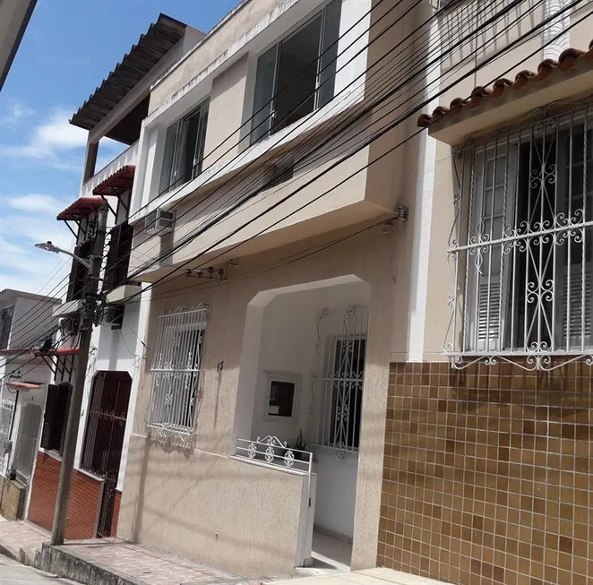 Foto 1 de Casa com 4 Quartos à venda, 119m² em Rio Comprido, Rio de Janeiro
