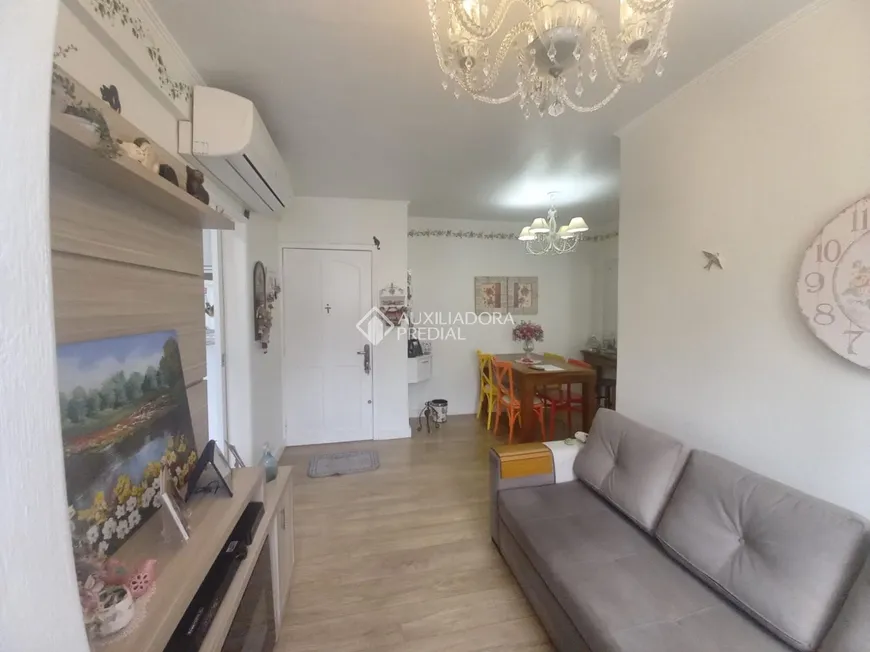 Foto 1 de Apartamento com 2 Quartos à venda, 52m² em Vila Nova, Porto Alegre