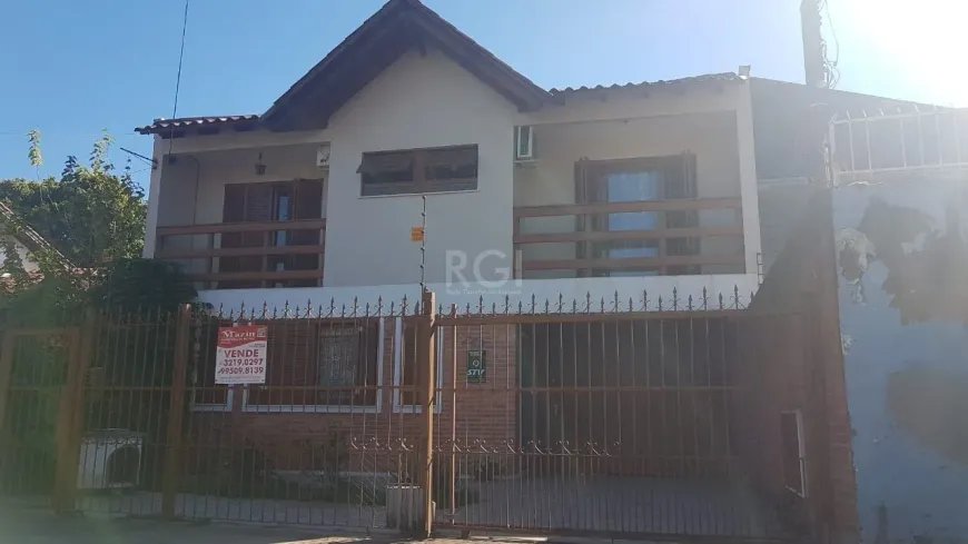 Foto 1 de Casa com 4 Quartos à venda, 242m² em Nonoai, Porto Alegre