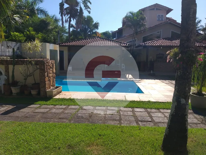 Foto 1 de Casa de Condomínio com 4 Quartos à venda, 1008m² em Barra da Tijuca, Rio de Janeiro