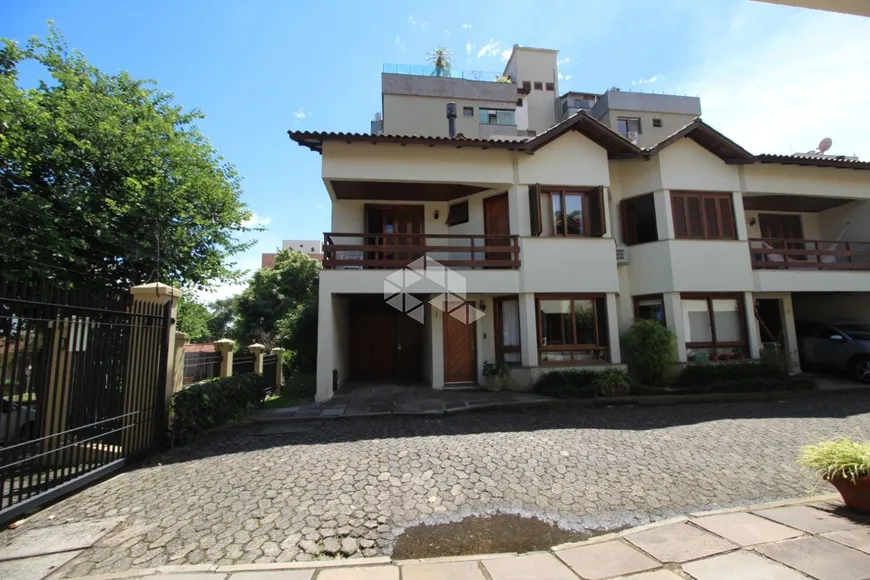 Foto 1 de Casa de Condomínio com 4 Quartos à venda, 233m² em Tristeza, Porto Alegre