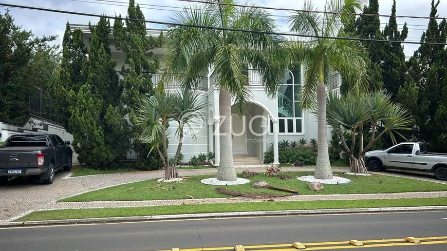 Foto 1 de Casa de Condomínio com 5 Quartos para venda ou aluguel, 690m² em Loteamento Alphaville Campinas, Campinas