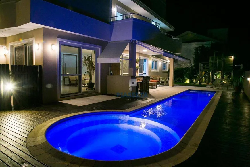 Foto 1 de Casa com 4 Quartos para venda ou aluguel, 437m² em Jurerê Internacional, Florianópolis