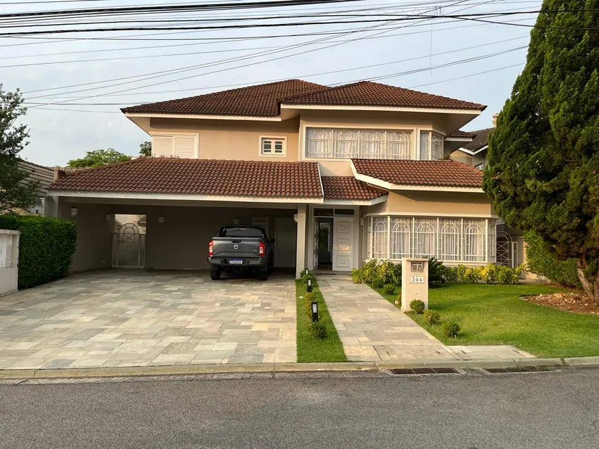 Foto 1 de Casa de Condomínio com 4 Quartos para venda ou aluguel, 600m² em Alphaville, Santana de Parnaíba