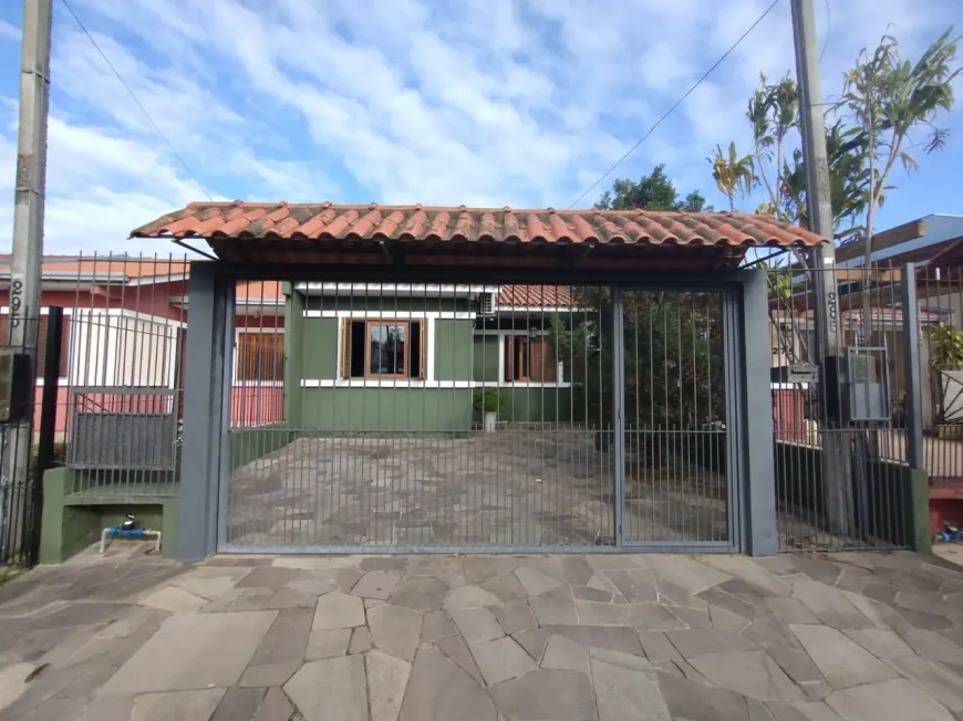 Foto 1 de Casa com 3 Quartos à venda, 64m² em Hípica, Porto Alegre