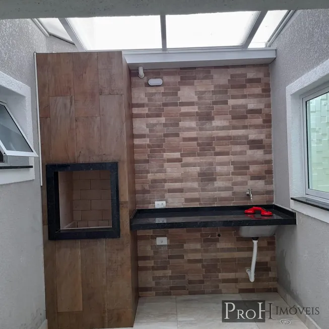 Foto 1 de Apartamento com 2 Quartos à venda, 56m² em Vila Scarpelli, Santo André