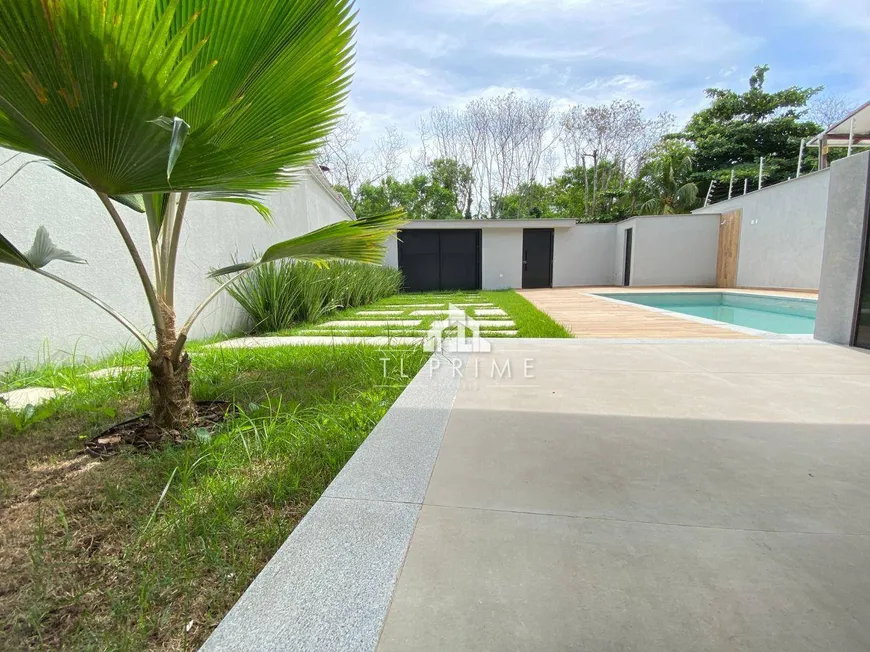 Foto 1 de Casa de Condomínio com 4 Quartos à venda, 340m² em Barra da Tijuca, Rio de Janeiro