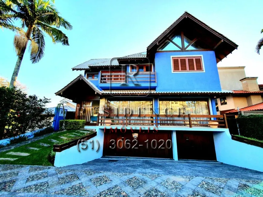 Foto 1 de Casa com 6 Quartos à venda, 400m² em Jurerê Internacional, Florianópolis
