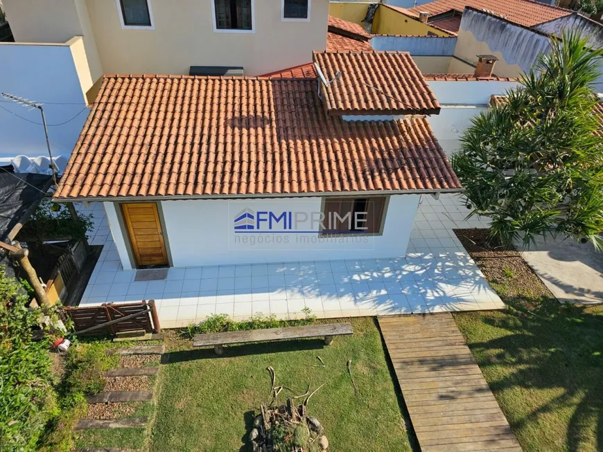 Foto 1 de Casa de Condomínio com 3 Quartos à venda, 300m² em Massaguaçu, Caraguatatuba