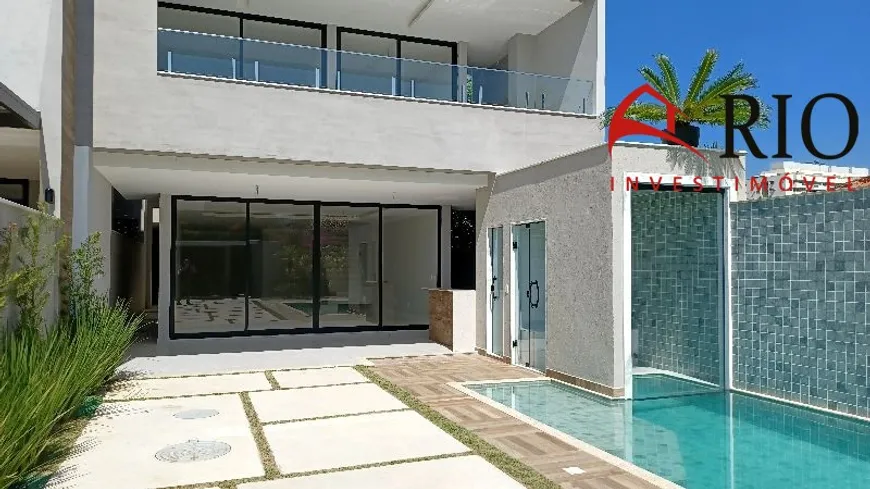 Foto 1 de Casa de Condomínio com 4 Quartos à venda, 360m² em Barra da Tijuca, Rio de Janeiro