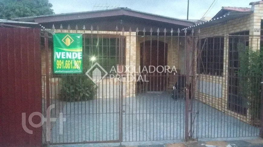 Foto 1 de Casa com 4 Quartos à venda, 285m² em Santa Fé, Porto Alegre